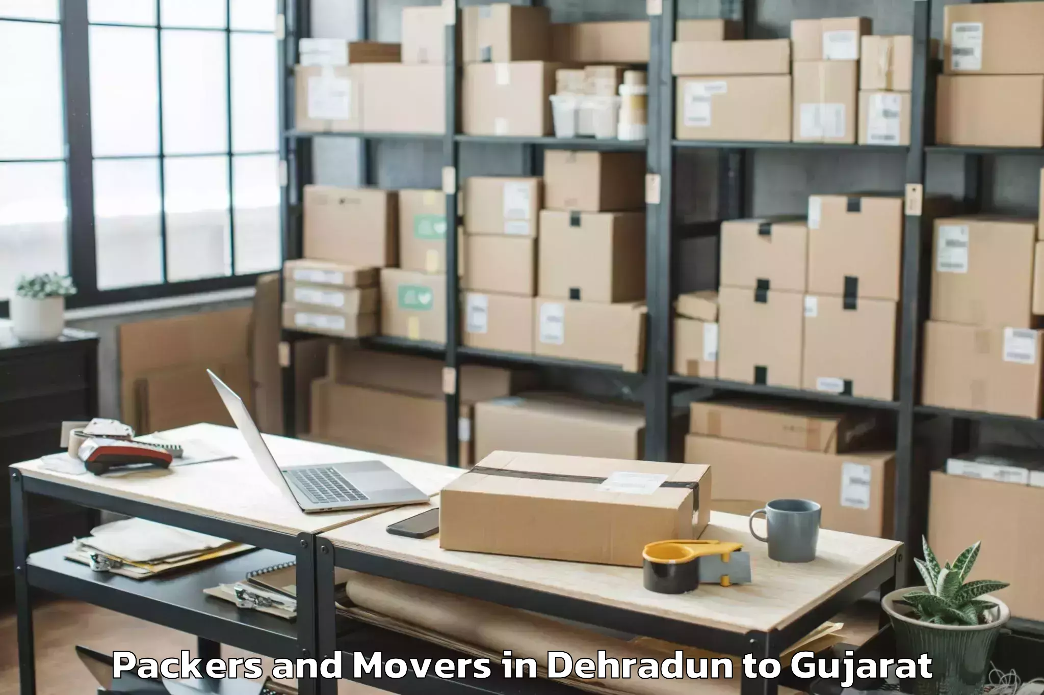 Book Dehradun to Vaghodia Ina Packers And Movers